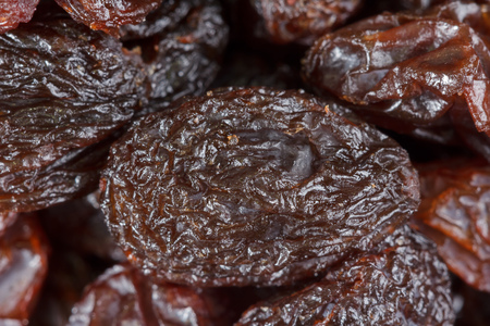 Close-up of lots of raisins from above filling up the whole frameの写真素材