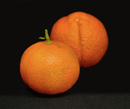 Citrus fruits on a black backgroundの写真素材