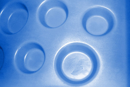 Circular hollows on plastic form.の写真素材