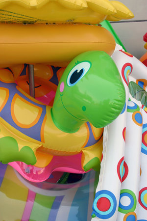 Stack of colored plastic air toys.の写真素材