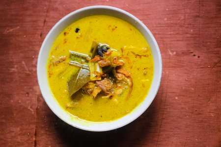 Delicious Yellow Curry Soup with Meat and Vegetablesの写真素材