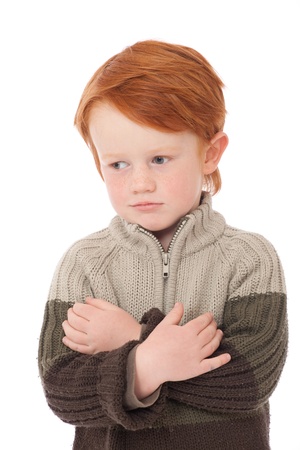 Ginger red hair haired boy smiling isolated on whiteの写真素材