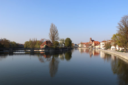 View down the river Isar in Landshut with refelctionsの写真素材
