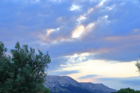 clouds over the bay of baskaの写真素材
