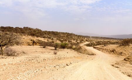 Lonely gravel road near the Natron Lake, Safari, East Africa, August 2017, Northern Tanzania