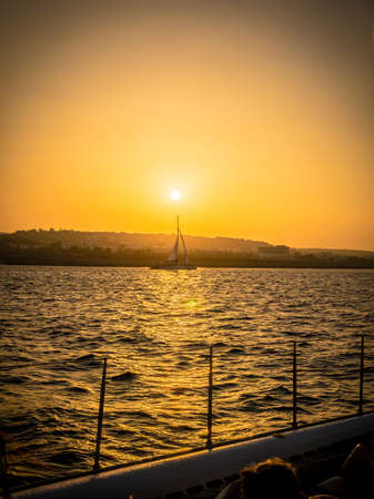Sunset on the sea in Ayia Napa Cyprus in summerの写真素材