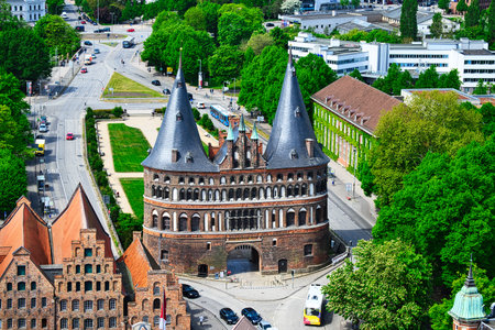 A view of the Holsten Gate in LÃ¼beck from the top of a church towerのeditorial素材