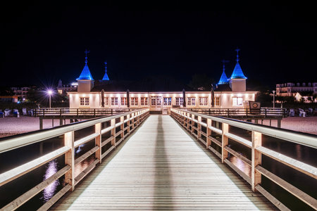 A view of the pier in Ahlbeck on the Baltic Sea at night on the island of Usedomの写真素材