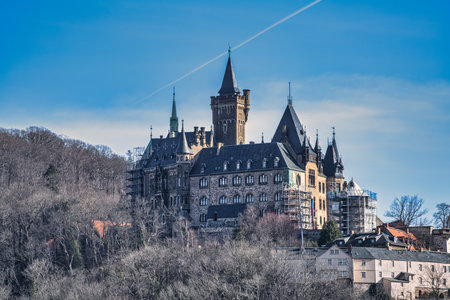 A view of the castle in Wernigerode under a blue skyの写真素材