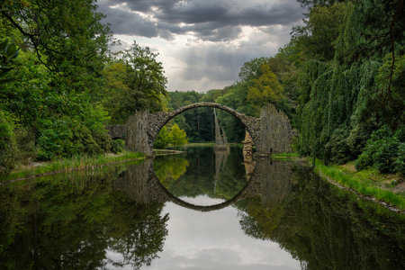 A view of the RakotzbrÃ¼cke bridge in Kromlauer Park in Saxonyの写真素材