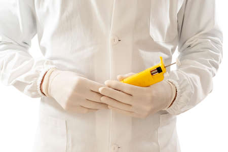 Doctor with gloves holding a pipetman of laboratory