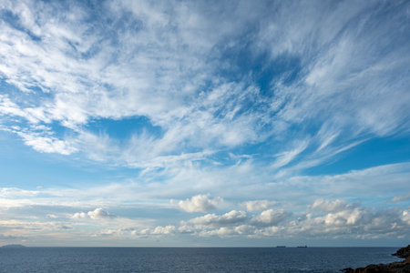 Ocean landscape with cloudy sky