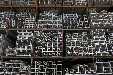 Aluminium bars stacked in the warehouseの写真素材