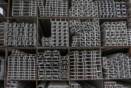 Aluminium bars stacked in the warehouseの写真素材