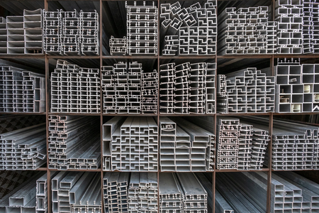 Aluminium bars stacked in the warehouseの写真素材