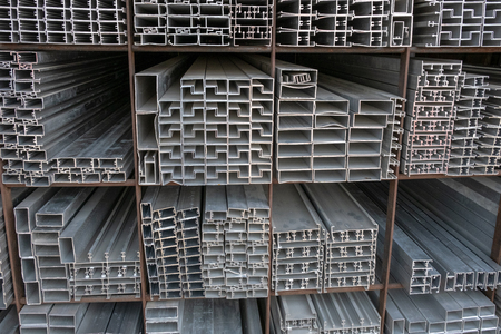 Aluminium bars stacked in the warehouseの写真素材