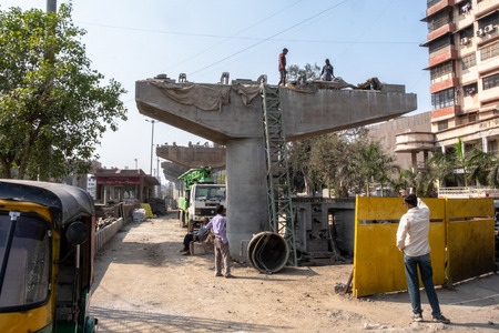 Workers in a bridge building siteのeditorial素材