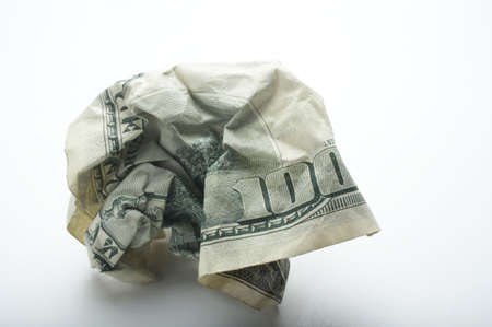 Crumpled up USA one hundred dollar billの写真素材