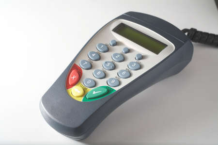 Debit card pinpad terminal on white background