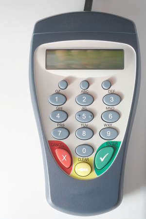 Debit card pinpad terminal on white background