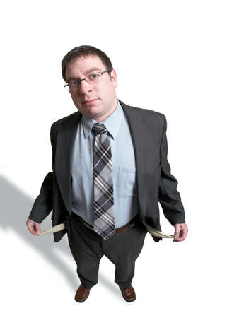 Man in suit with empty pockets isolated on white