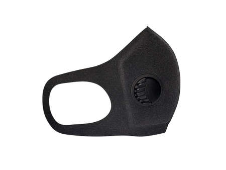Black foam mask for protection against viruses, bacteria and dust, with a purification filter on a white background.の写真素材