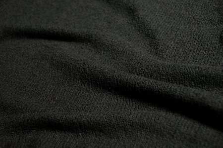 Thick black fabric texture background with smooth waves and seamlessの写真素材