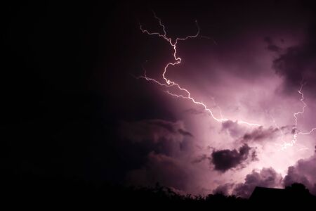 Lightning strike with cloudsの写真素材