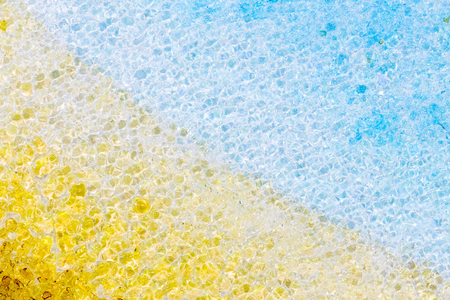 beautiful bright colored stained glass, molten glass chippings の写真素材