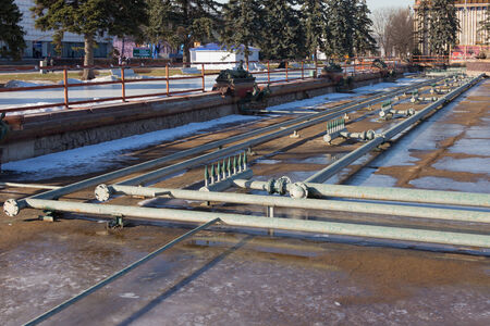 MOSCOW - February 2014  outdoor fountain in the winter off and seen a plurality of tubes, in...