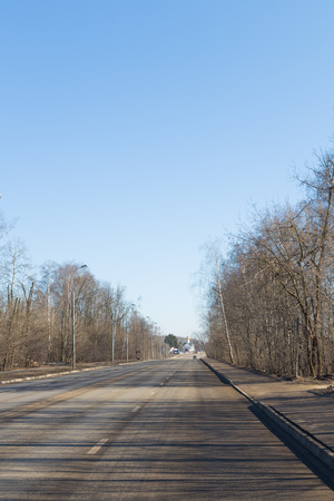 Road distance to the Christian church and blue skyの写真素材
