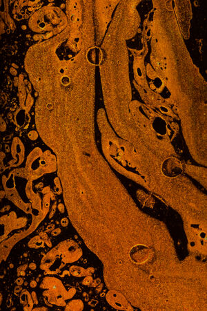 abstraction with bright red spots on a dark background