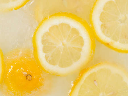 unusual citrus delicious fresh fruit ice cream with pieces of lemon in sweet syrupの写真素材