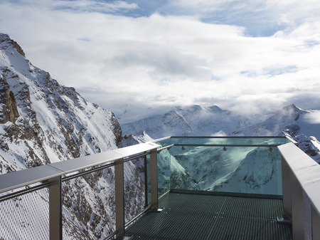 Zell am See - Kaprun - December 6, 2014: A stunning view from the observation deck of the Alps at an altitude of 3000 m on the glacier Kitssteynhorn December 6, 2014, Zell am Cee - Kaprun, Austriaのeditorial素材
