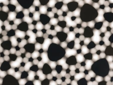 black and white abstract blurred with honeycomb ornamentの写真素材