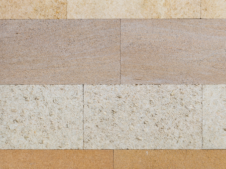 Light beige travertine smooth handsome, four different shades and with small pits and inclusions