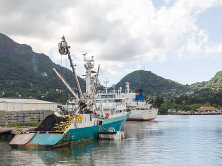 Mahe - November 10, 2014: Fishing boat and nets stacked on the deck in the port of the island of...