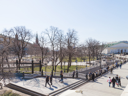 Moscow - April 12, 2015: Spring in the Alexander Garden in Moscow and people walk the walls of the ancient Kremlin on April 12, 2015, Moscow, Russiaのeditorial素材