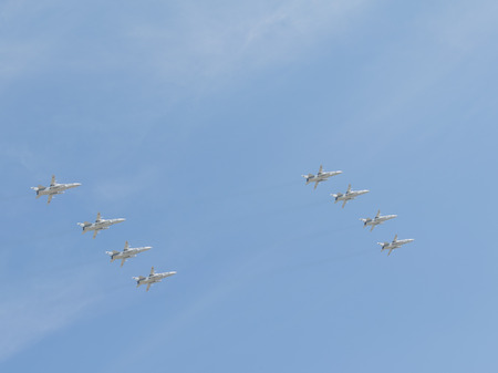 Moscow - May 9, 2015: eight Su-24 aircraft formation flying against a blue sky with clouds May 9, 2015, Moscow, Russiaのeditorial素材