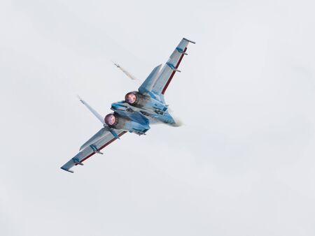 Moscow Region - June 17, 2015: Military aircraft Su-27 Russian Knights aerobatic team perform...