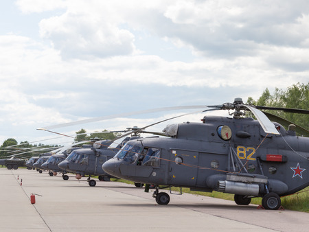 Moscow Region - June 17, 2015: Many gray military helicopters Russian Air Force on International Military-Technical Forum ARMY-2015 June 17, 2015, Moscow Region, Russiaのeditorial素材