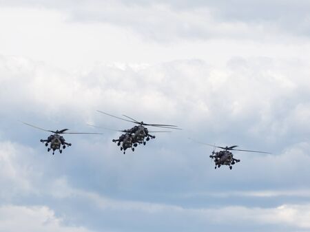 The Moscow region - 17 June 2015: Aerobatic team take on gray Mi-28 show aerobatics June 17, 2015,...