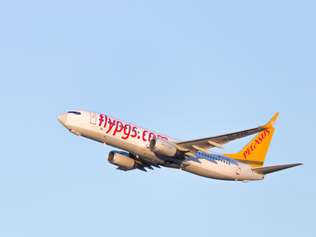 Moscow - August 20, 2015: A passenger plane Boeing 737-86N (W) Pegasus Airlines flies high at Domodedovo airport and the blue sky August 20, 2015, Moscow, Russiaのeditorial素材