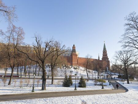 Moscow - November 29, 2015: View of the Alexander Garden and the Moscow Kremlin in the morning, tourists walk and snow is November 29, 2015, Moscow, Russiaのeditorial素材