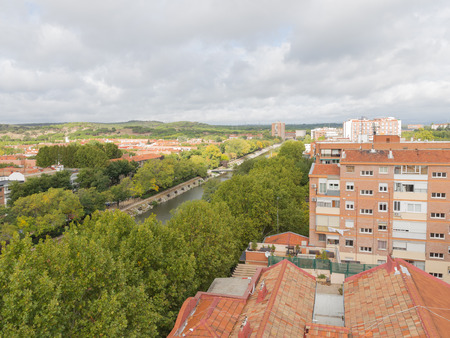 Madrid - 6 October 2015: Aerial view of Madrid with red roofs and river Manzanares October 6, 2015, Madrid, Spainのeditorial素材