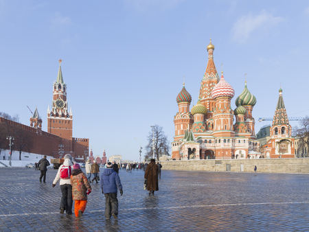 Moscow - January 7, 2016: Bright unusual multicolored domes of the ancient St. Basil's Cathedral on...