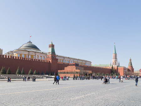 Moscow - April 12 2015: Lenin's Mausoleum on Red Square, and a lot of people walk and see the sights at the Kremlin April 12, 2015, Moscow, Russiaのeditorial素材