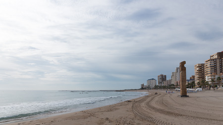 El Campello - October 3, 2015: Beautiful clean city beach with sand in the morning, in the fall 3 October 2015 El Campello, Costa Blanca, Spainのeditorial素材