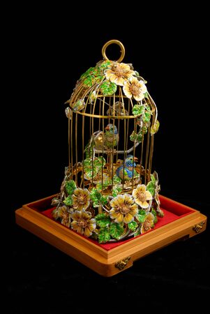 Exclusive cage with canaries of gold, silver and precious stonesの写真素材