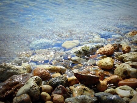 colored stones at the shore of the Black Seaの写真素材